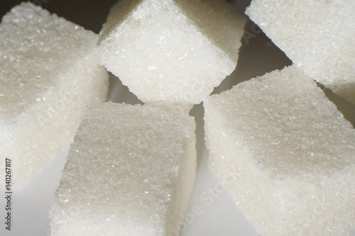 refined sugar closeup on a white background
