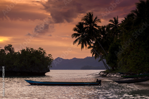 Waigeo Island Indonesian Sunset. A colorful sunset in the Saporkren Village in the Raja Ampat area of West Papua, Indonesia.