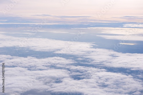 Blue sky and Clouds as seen through window of aircraft © CasanoWa Stutio