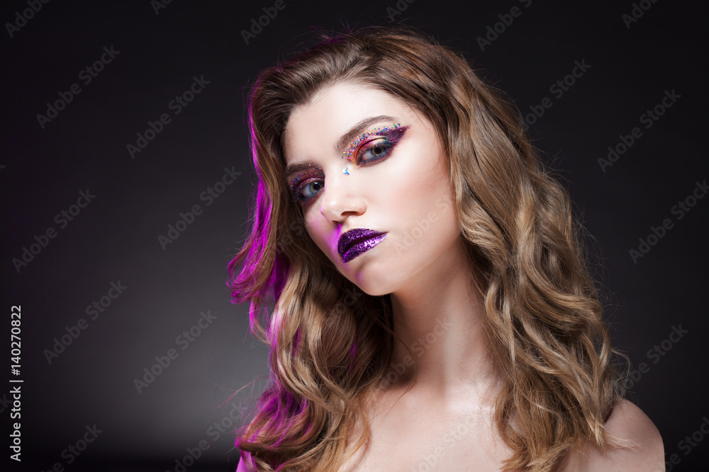 Fototapeta premium Young beautiful girl with creative make up. Attractive blonde, close-up