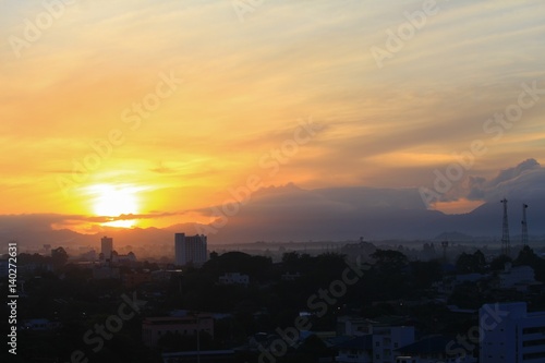sunrise sky in the morning and silhouette building in city  colorful nature. with copy space for add text
