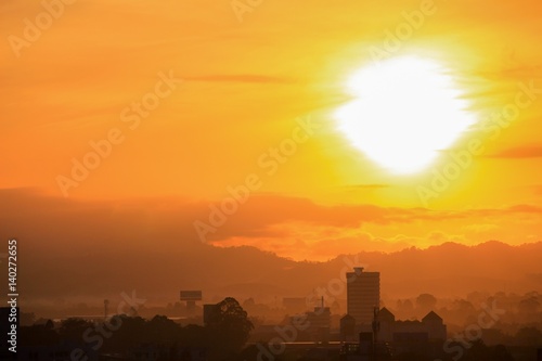 sunrise sky in the morning and silhouette building in city  colorful nature. with copy space for add text