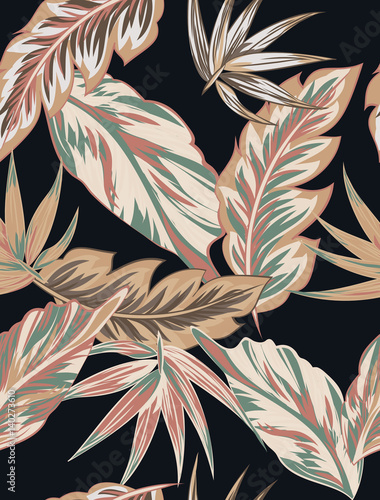 Tropical flowers, jungle leaves, bird of paradise flower.