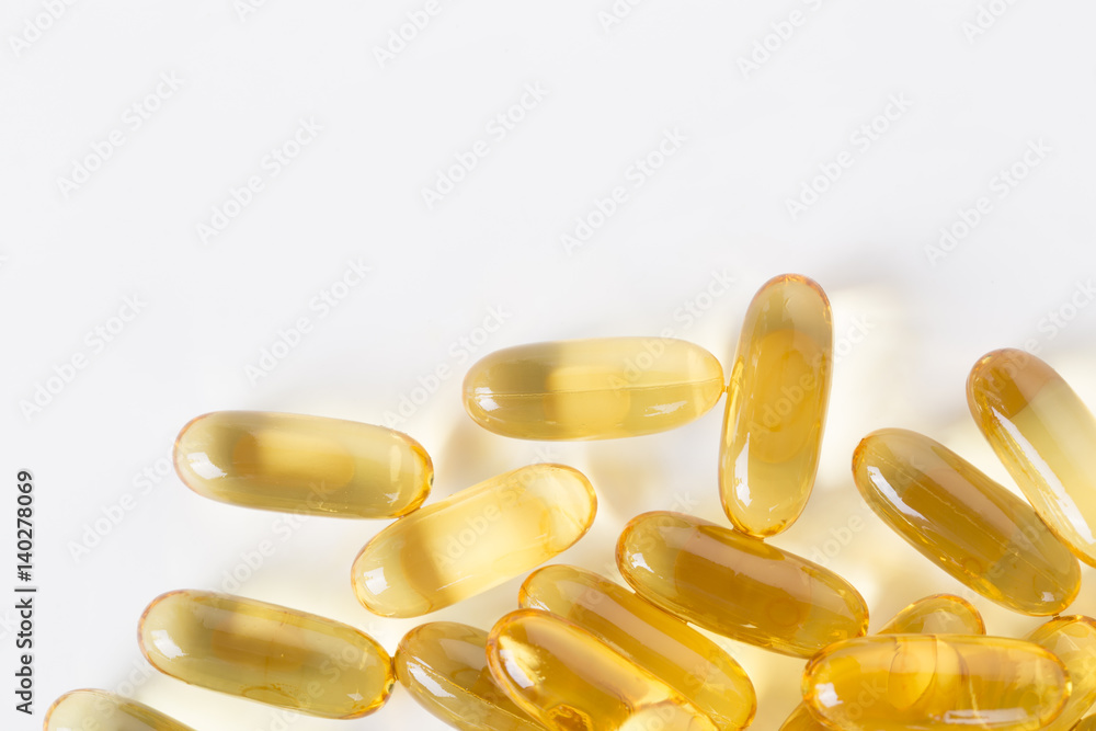 Fish oil capsules isolated on a white background. Fish oil capsules isolated on a white background.
