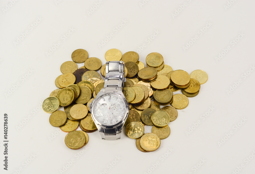 Broken watch with gold coins on white background Stock Photo Adobe Stock