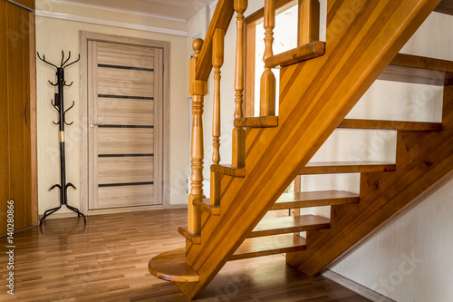 Billede på lærred Steps wooden interior stairs of a private house close-up.