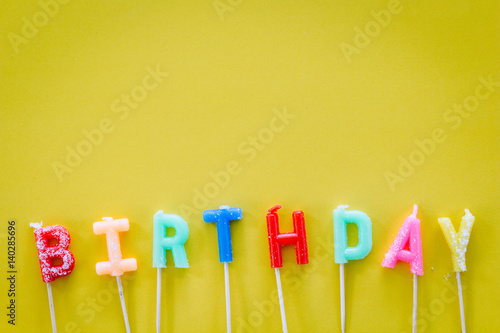 Colored Candles with Text Happy Birthday