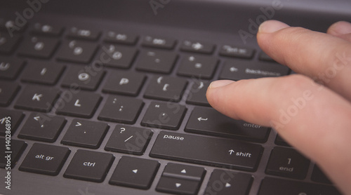 hand typing on keyboard ,closeup photo