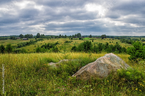 Landscape with a Russian village and a large foreground stone