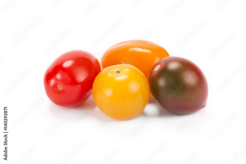 Multicolored cherry tomatoes isolated on white background Multicolored cherry tomatoes isolated on white background