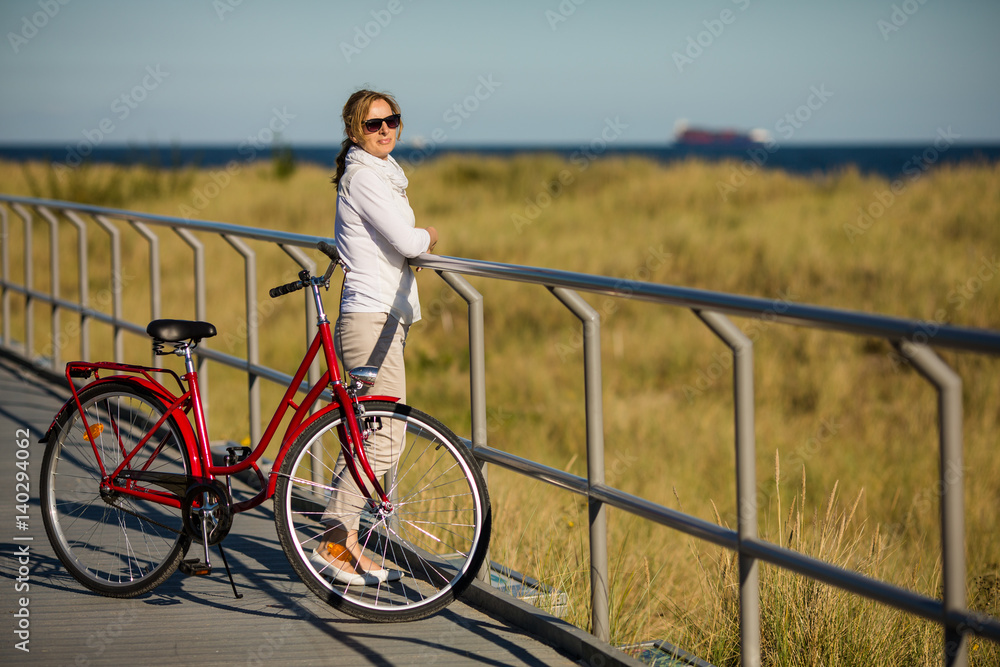 Woman riding bike outdoor