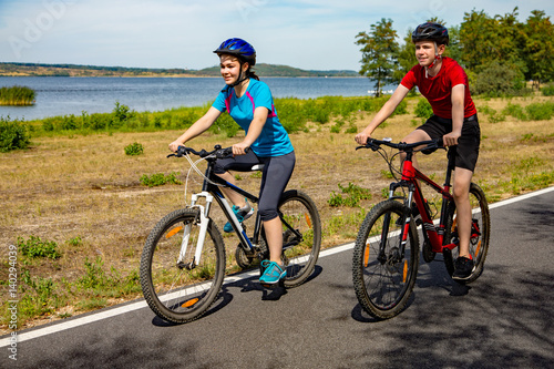 Boy and girl cycling outdoor