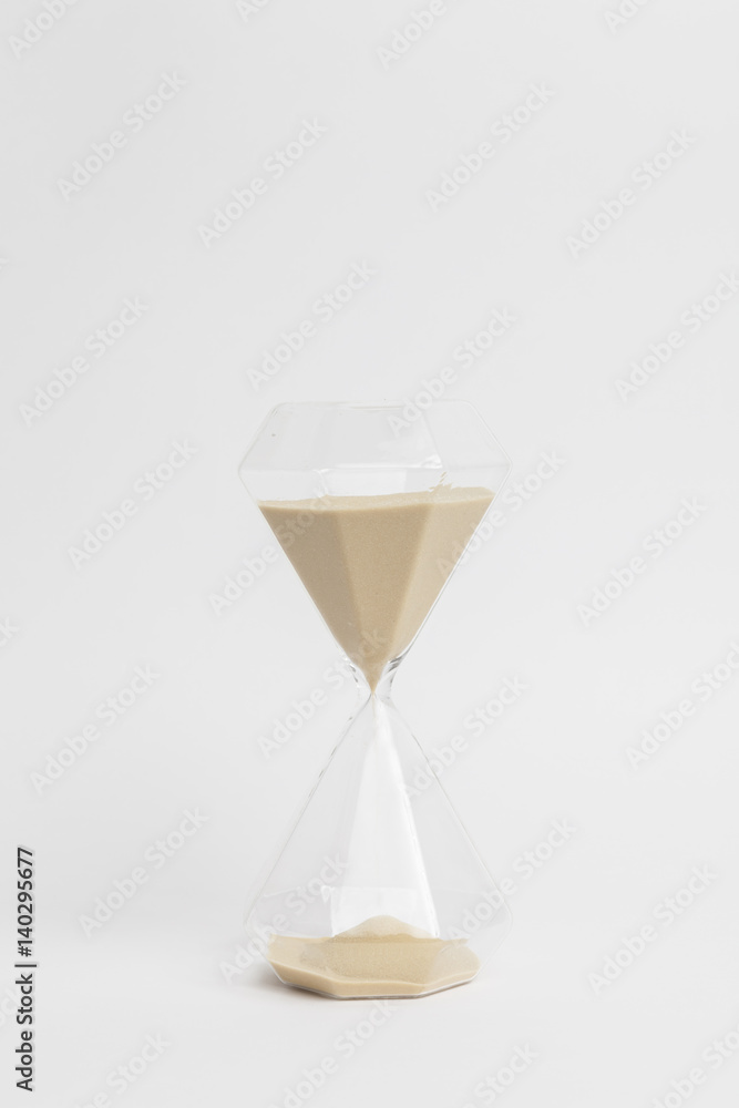 hourglass closeup on white background hourglass closeup on white background