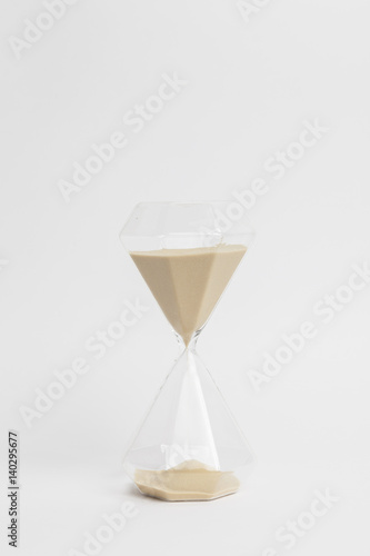hourglass closeup on white background