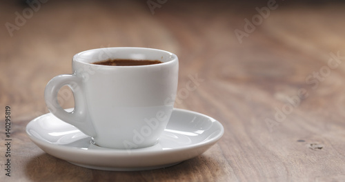cup of fresh espresso on table with copy space  4k unedited photo