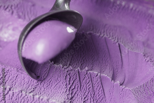 scooping violet ice cream close up shot shallow focus
