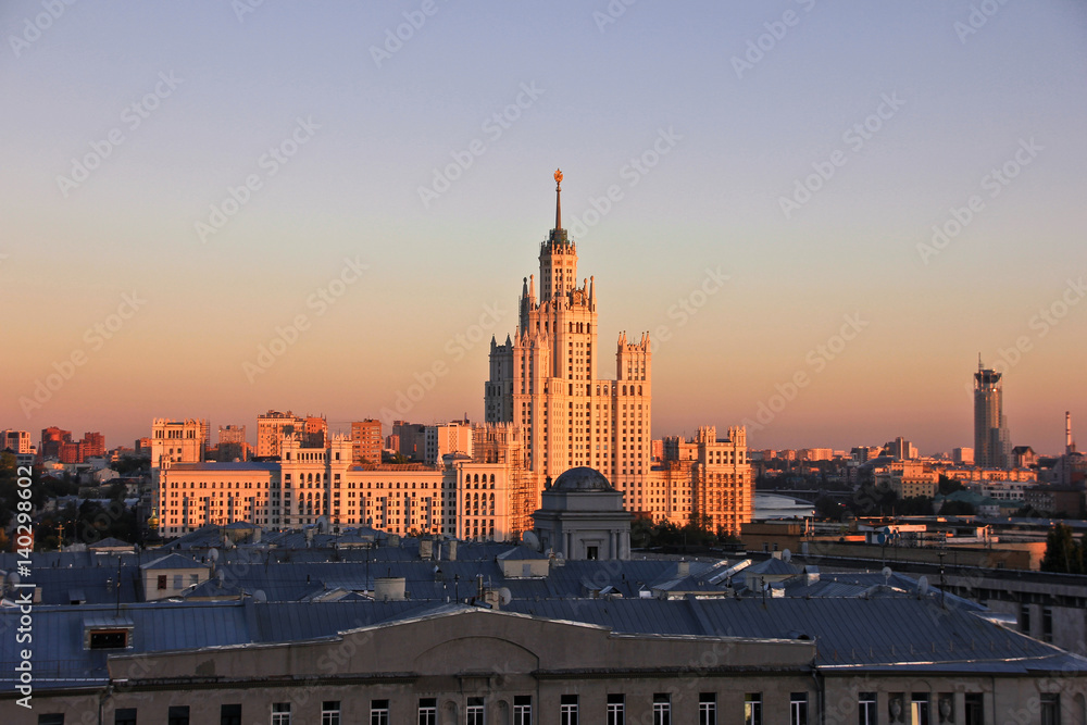 Skyscraper in Moscow designed in the Stalinist style on sunset