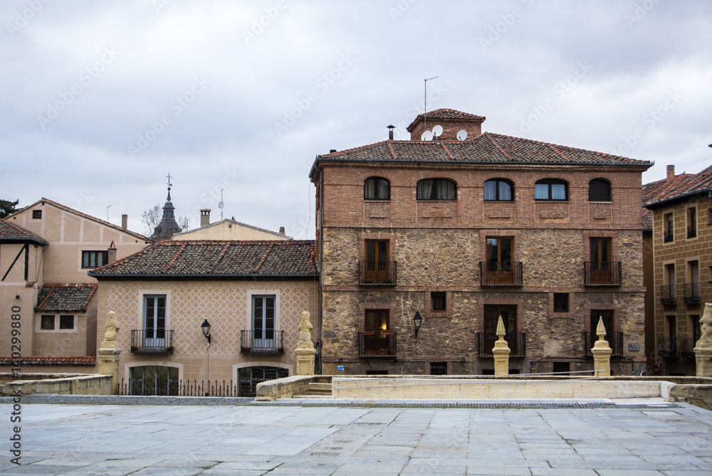 A medieval square with old decorated houses at the historical center of Segovia, Castille and Leon, Spain.