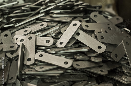 Stamping plates of complex shape, made of steel on CNC machines, presses