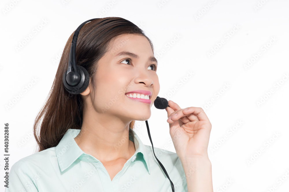 Portrait of happy smiling asian woamn support phone operator in headset Portrait of happy smiling asian woamn support phone operator in headset
