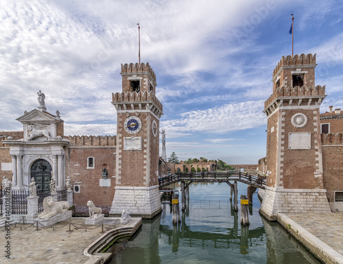 Magnificent view of the entrance towers to the arsenal of Venice, Italy, under a beautiful sky