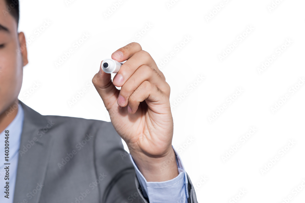 Business man writing with marker writing something on glass board isolated on white background Business man writing with marker writing something on glass board isolated on white background