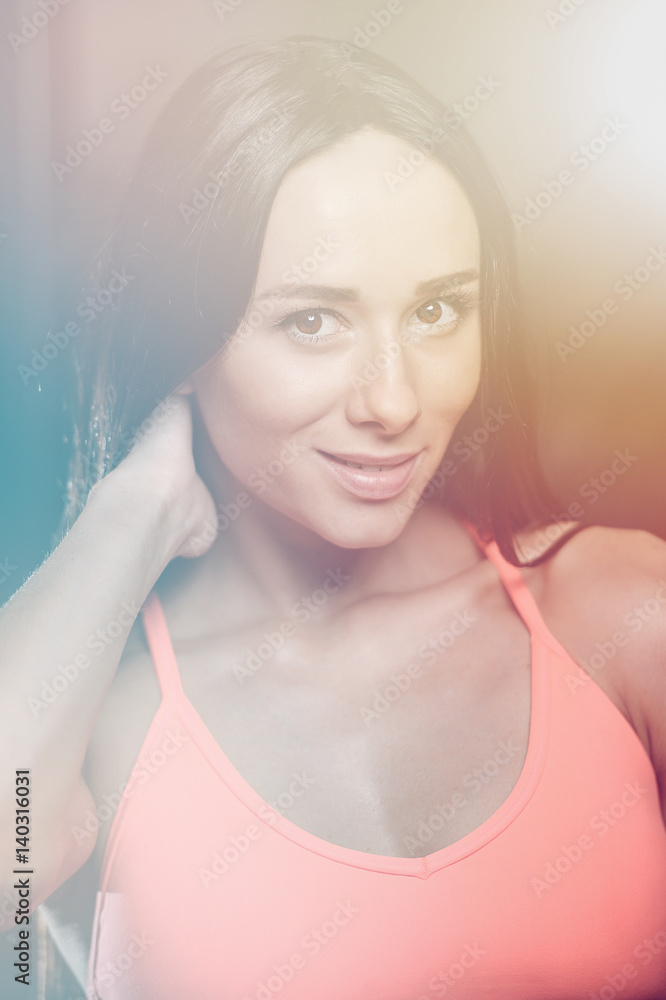 portrait of beautiful sexy girl on background of gym portrait of beautiful sexy girl on background of gym
