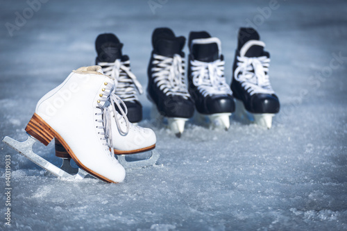 Skates for winter sports in the open air on the ice. photo