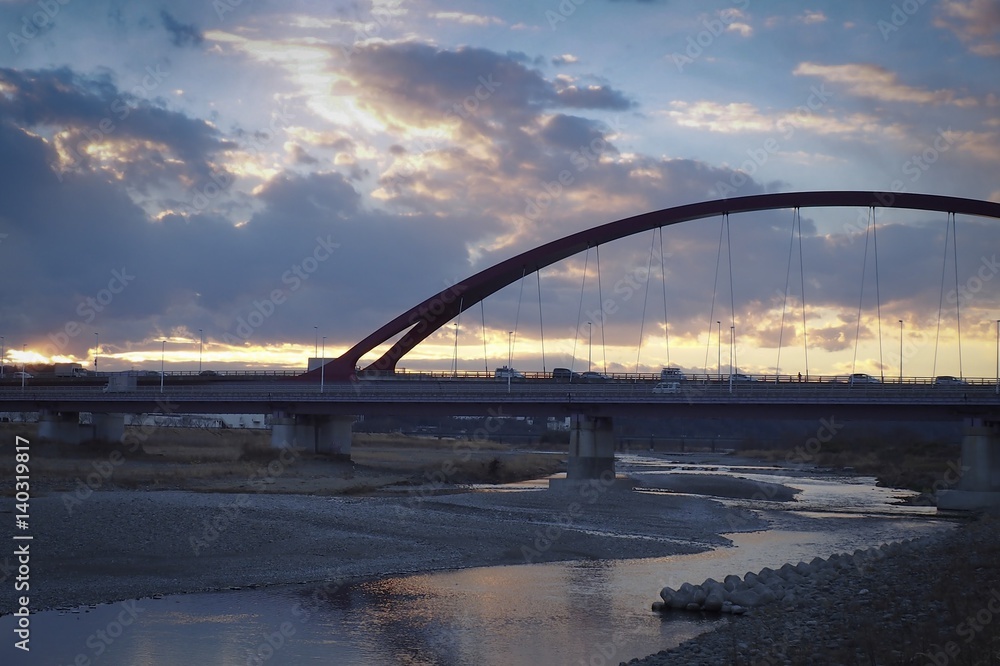 Sunset river and bridge