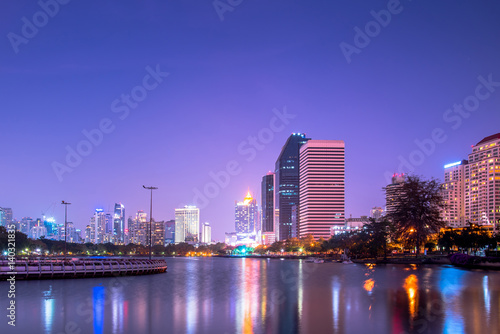 Bangkok city downtown at night with reflection of skyline  Bangkok Thailand