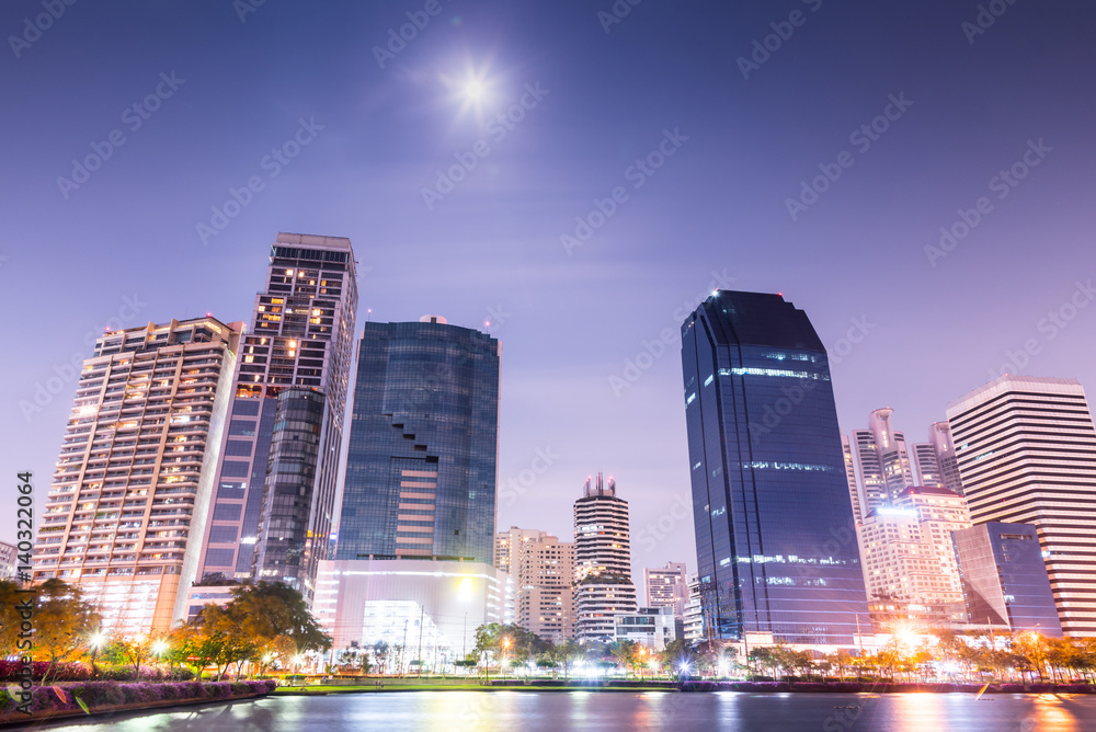 Bangkok city downtown at night with reflection of skyline, Bangkok,Thailand