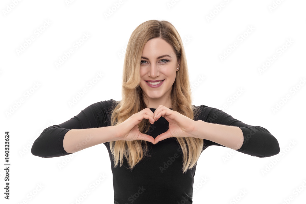 Beautiful blond woman showing heart sign with her hands. Beautiful blond woman showing heart sign with her hands.
