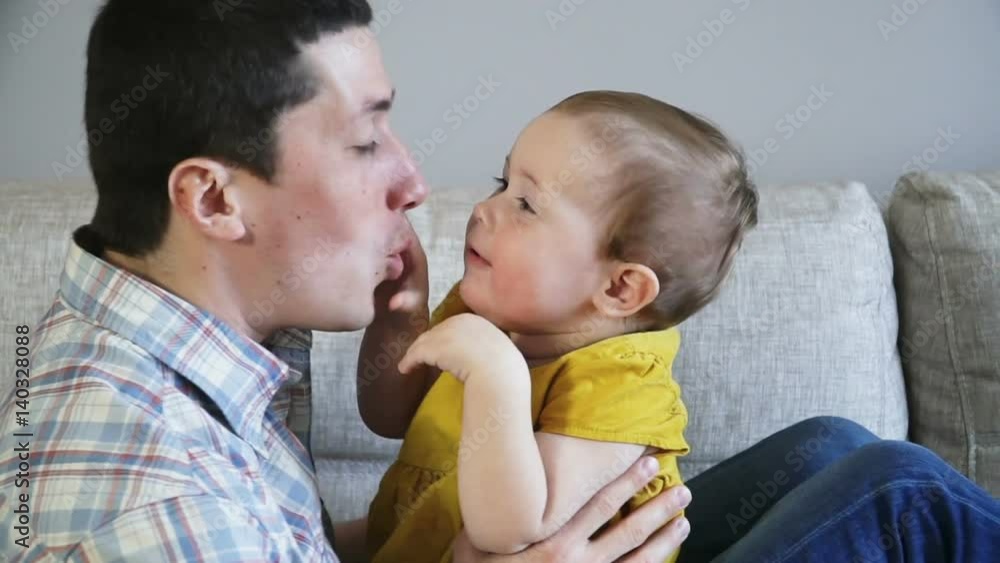 Father and his baby girl hugging, kissing and smiling, close up. Resting together. Family concept. Full Hd Slow Motion Stock Footage.
Father and his baby girl hugging, kissing and smiling, close up. Resting together. Family concept. Full Hd Slow Motion Stock Footage.