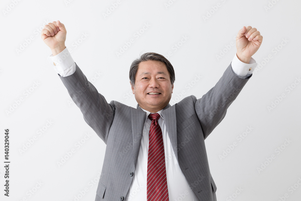 ガッツポーズ 万歳をするビジネスマン 中年男性 Stock Photo Adobe Stock