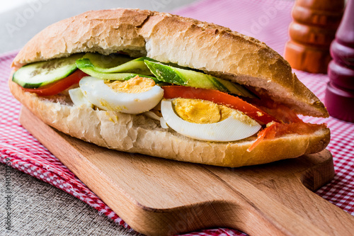 Egg Sandwich with cucumbers and tomatoes.