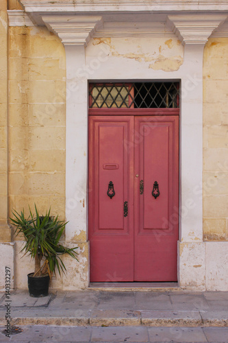 Facade of the house in the town of Mdina in Malta