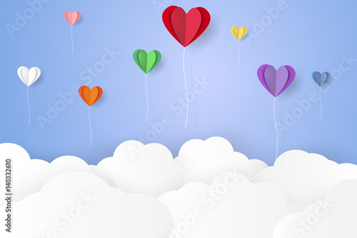 Colorful heart balloons flying over cloud , paper art style
