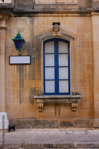 Facade of the house in the town of Mdina in Malta