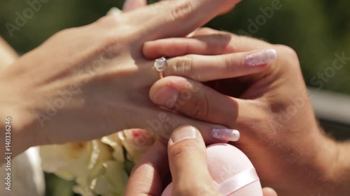 Romantic marriage proposal. Wedding ring and roses. Love Story.
