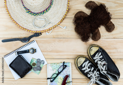 Top view of Traveler's accessories, Essential vacation items, Travel concept background.