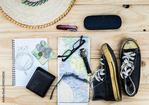 Top view of Traveler's accessories, Essential vacation items, Travel concept background.