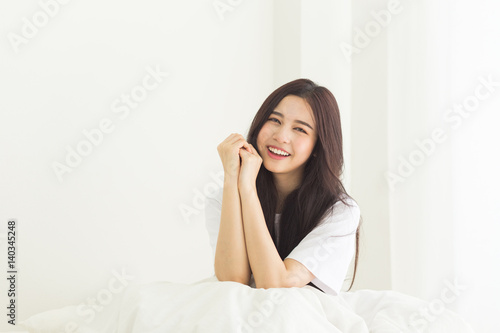 Young asian lady chilling at home