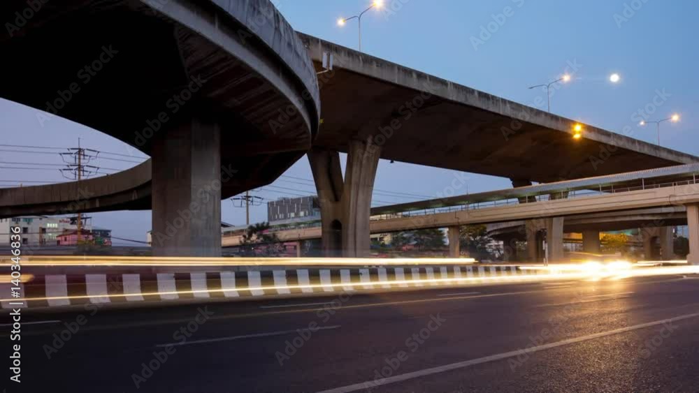 busy traffic under the expressway at night in Bangkok city, Thailand busy traffic under the expressway at night in Bangkok city, Thailand