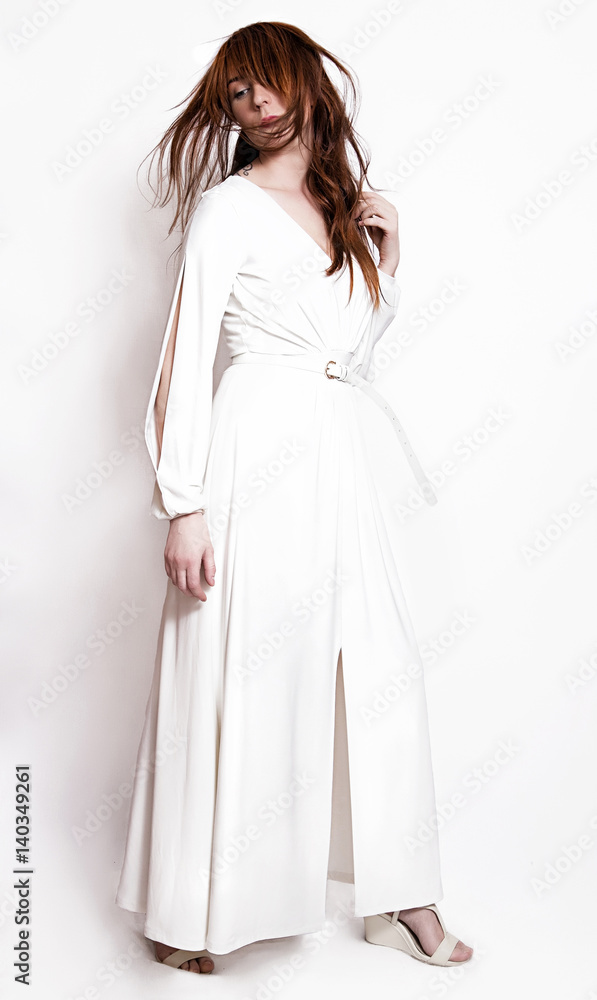 beautiful fashion girl in white long dress