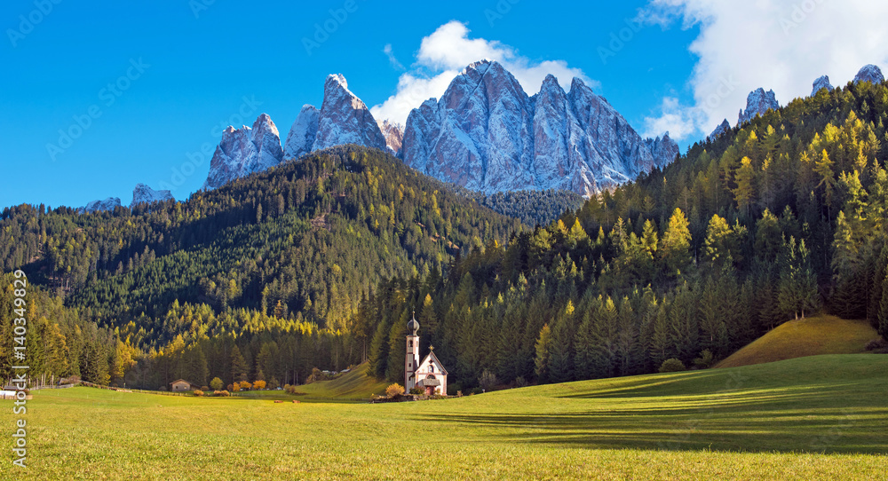 Magical landscape with a church in the valley of Santa Magdalena, Italy, Europe, Dolomites