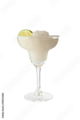 Classic margarita cocktail with lime slice and salty rim. Isolated on white background with clipping path