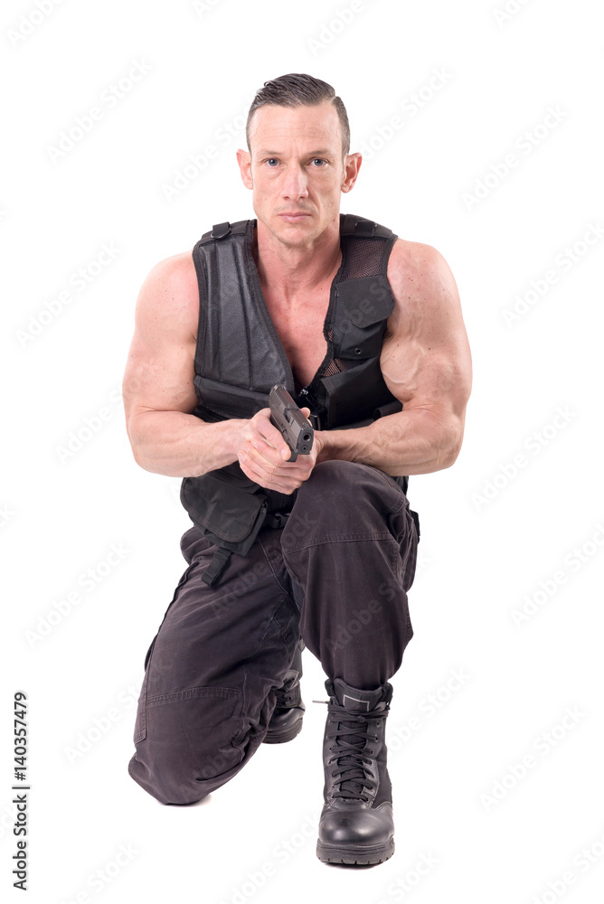 Naklejka premium tactical law enforcer posing isolated in white