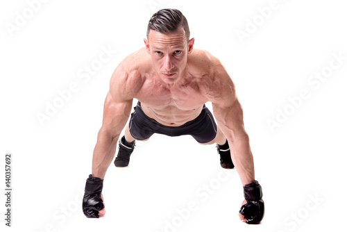 fighter posing with gloves isolated in white