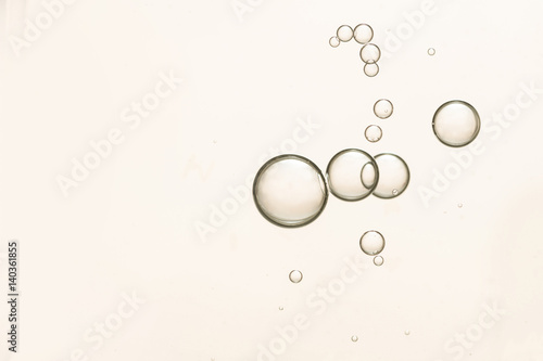 Light brown air bubbles osolated over a blurred background