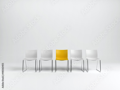 Row of empty chairs on white